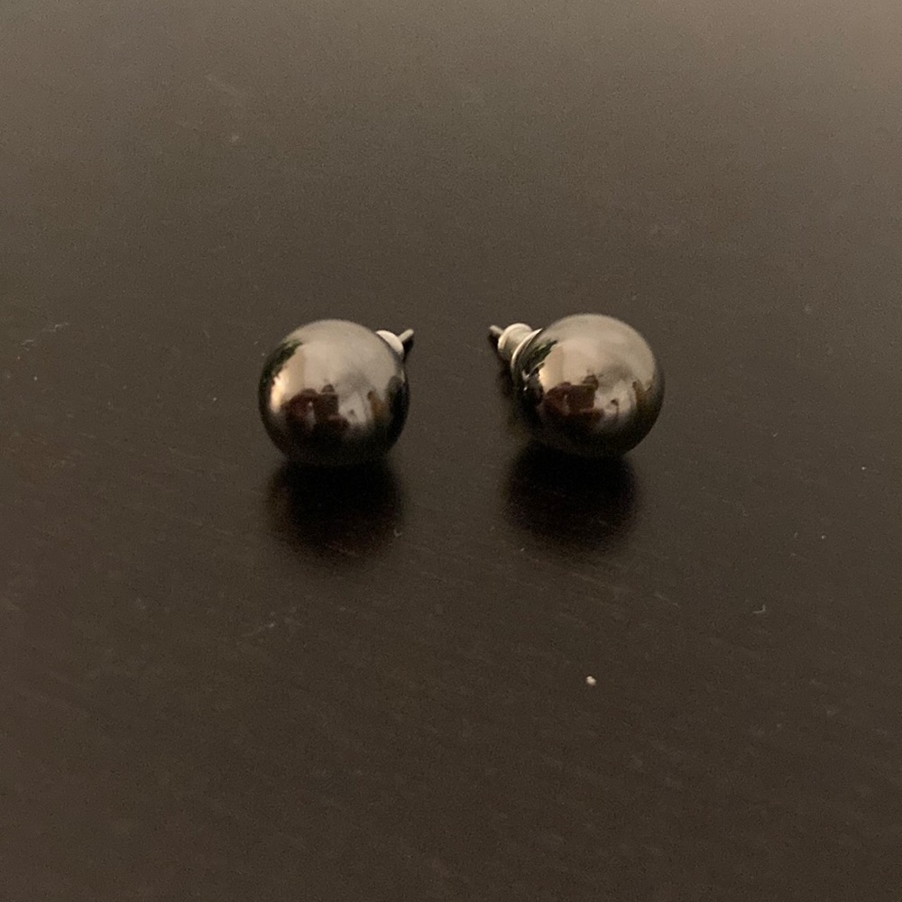 Steel metallic ball earrings.